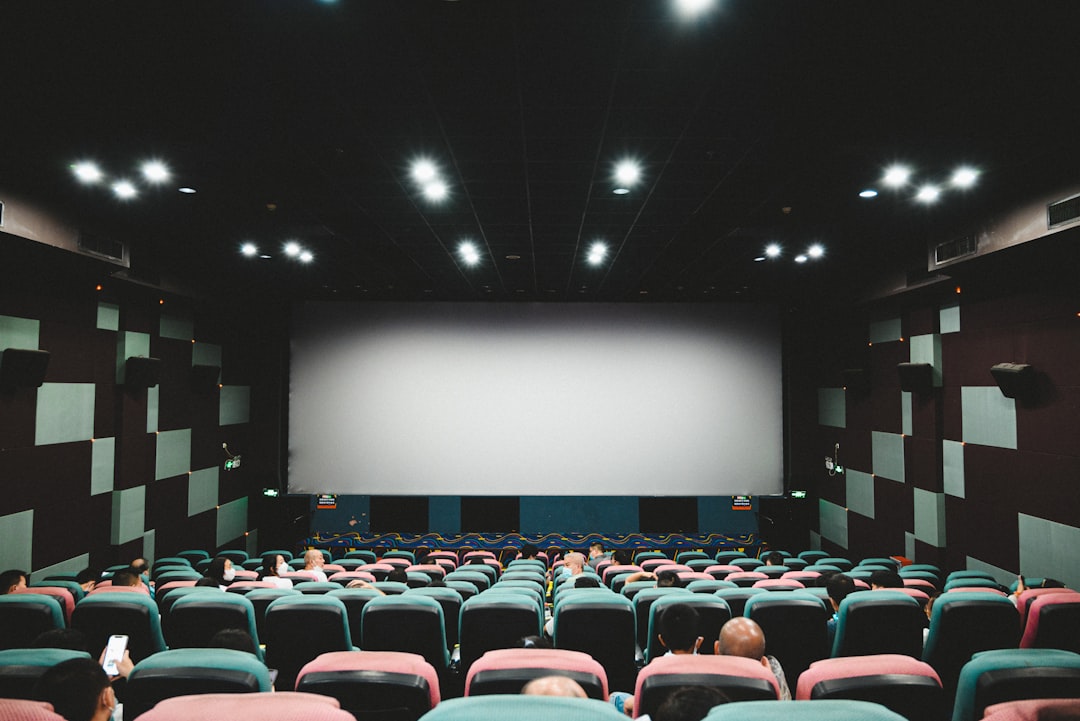 hero-img-02 a-movie-theater-with-rows-of-empty-seats-rl-numw1lgq